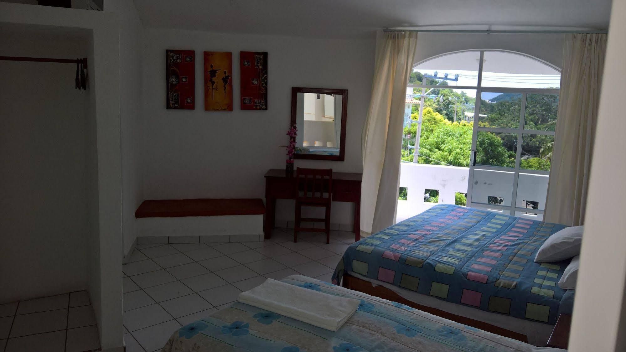 Hotel Cz Santa Cruz Huatulco Bagian luar foto