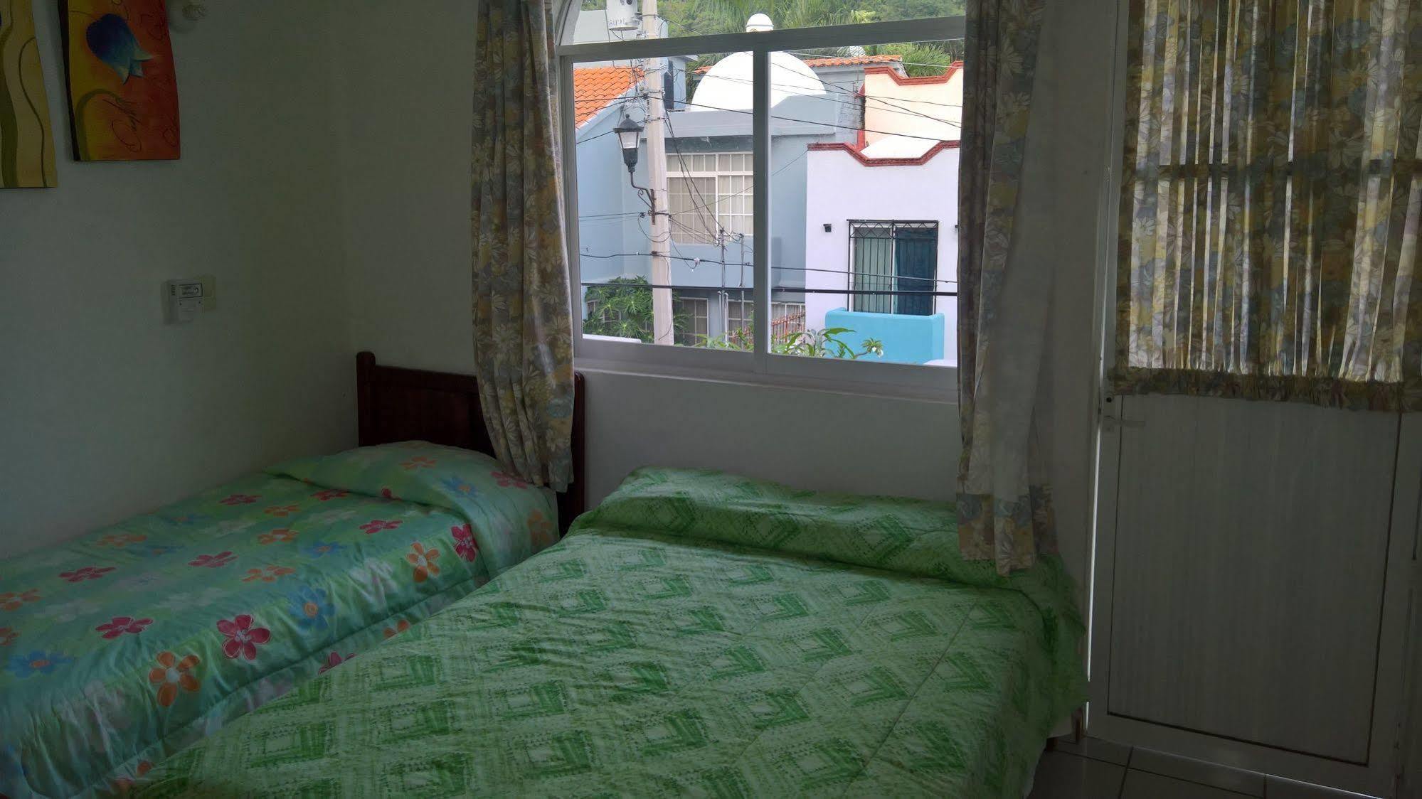 Hotel Cz Santa Cruz Huatulco Bagian luar foto